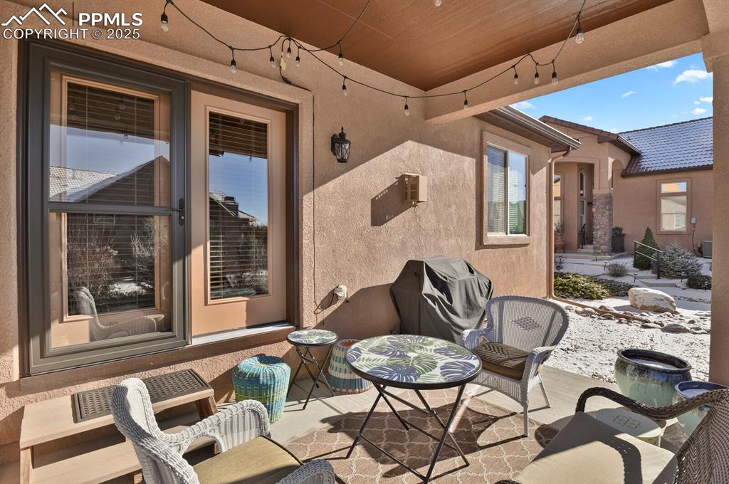 13015 Cake Bread Heights Colorado Springs, CO 80921 - Photo 39 of 45 a backyard of a house with table and chairs
