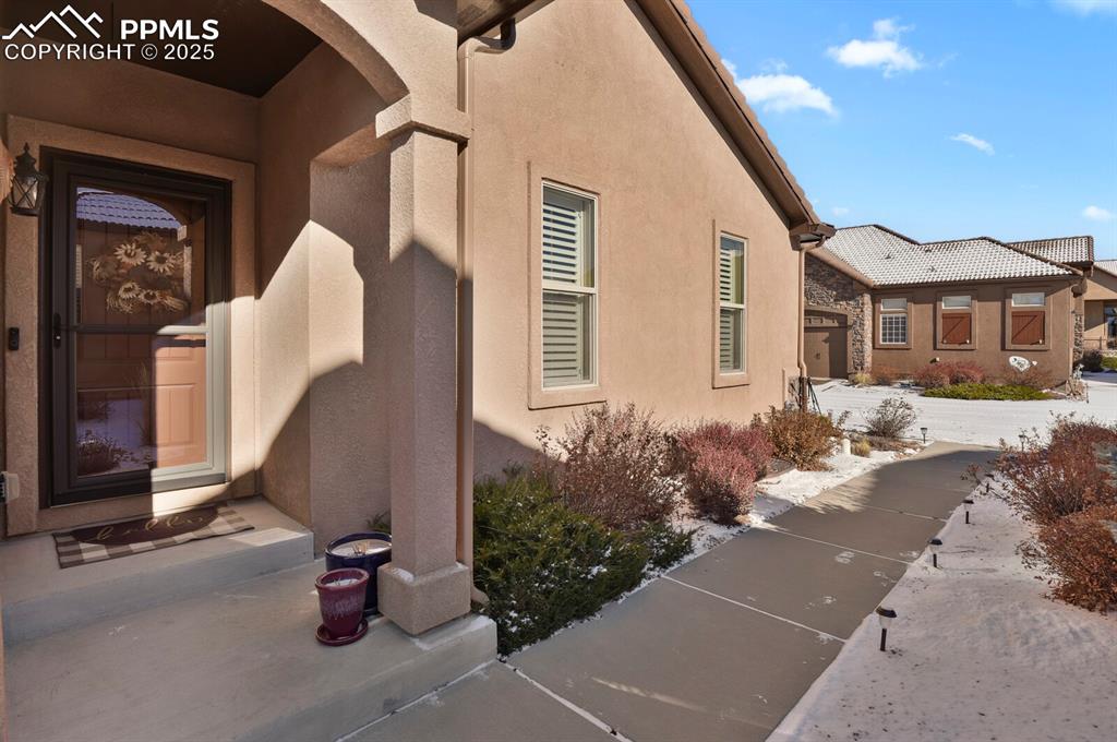 13015 Cake Bread Heights Colorado Springs, CO 80921 - Photo 41 of 45 a front view of a house with garden