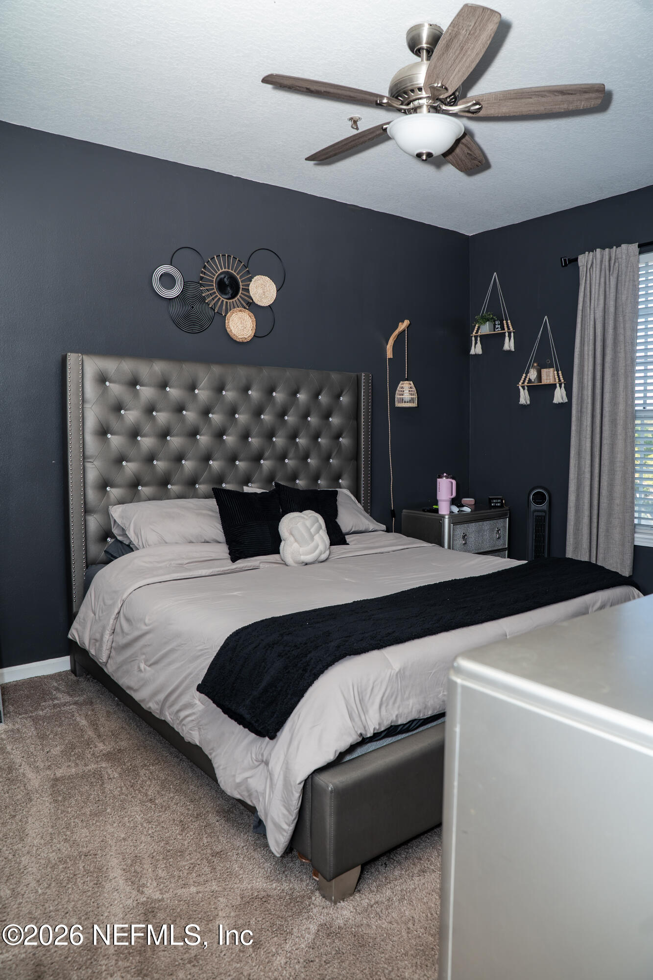 7990 Baymeadows Road East, Unit 530 Jacksonville, FL 32256 - Photo 13 of 19 a bedroom with a bed and a lamp