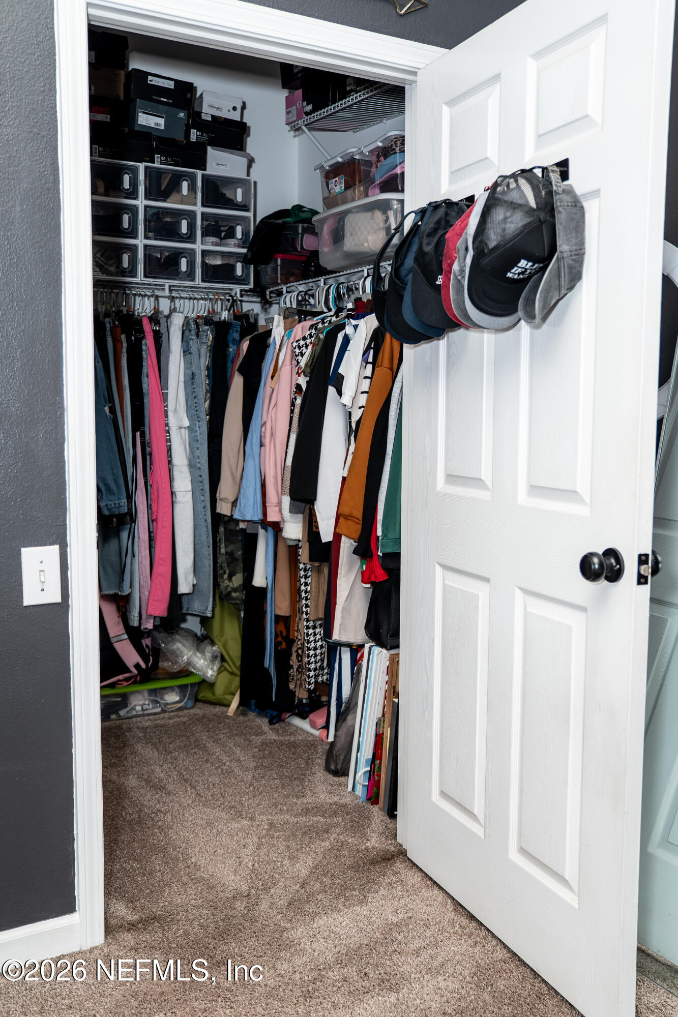 7990 Baymeadows Road East, Unit 530 Jacksonville, FL 32256 - Photo 15 of 19 a view of walk in closet with clothes and shoes