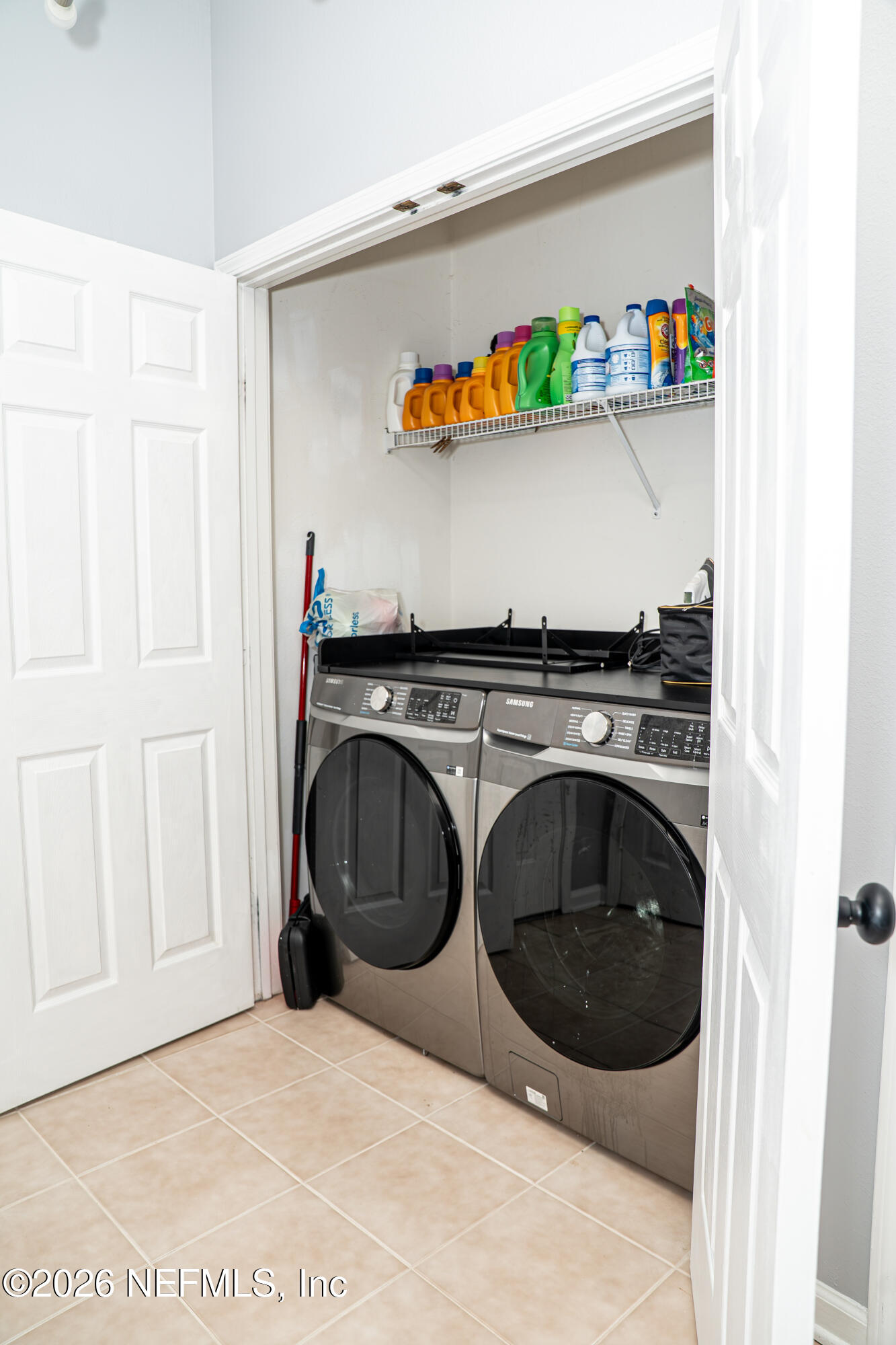 7990 Baymeadows Road East, Unit 530 Jacksonville, FL 32256 - Photo 17 of 19 a utility room with dryer and washer