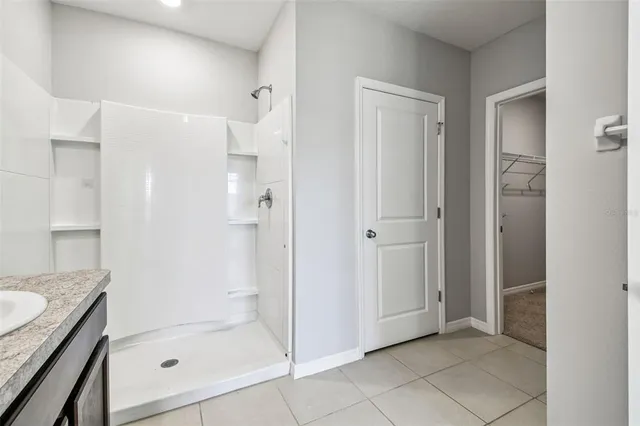 a view of a backyard of the house