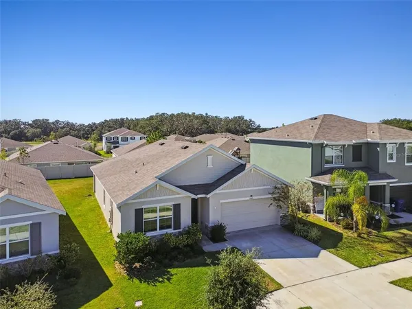 a view of a swimming pool with a terrace