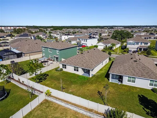 a group of cars parked in a field