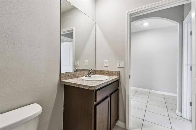 an empty room with closet area