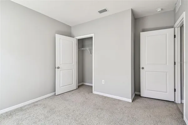 an empty room with closet
