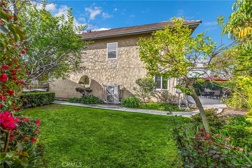 8167 Crowley Circle Buena Park, CA 90621 - Photo 28 of 43 a front view of a house with a yard