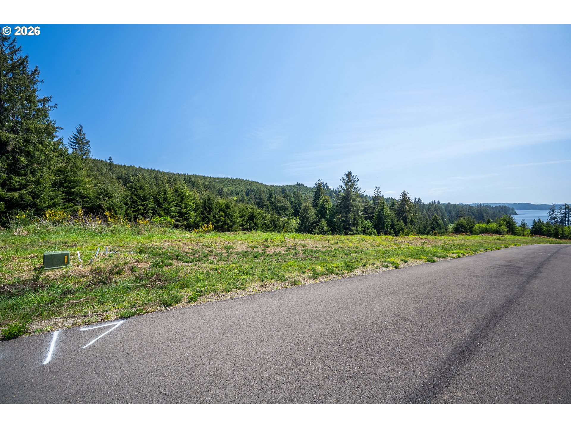 Clear Lake Road, Unit 7 Florence, OR 97439 - Photo 2 of 12 a view of a field with a yard