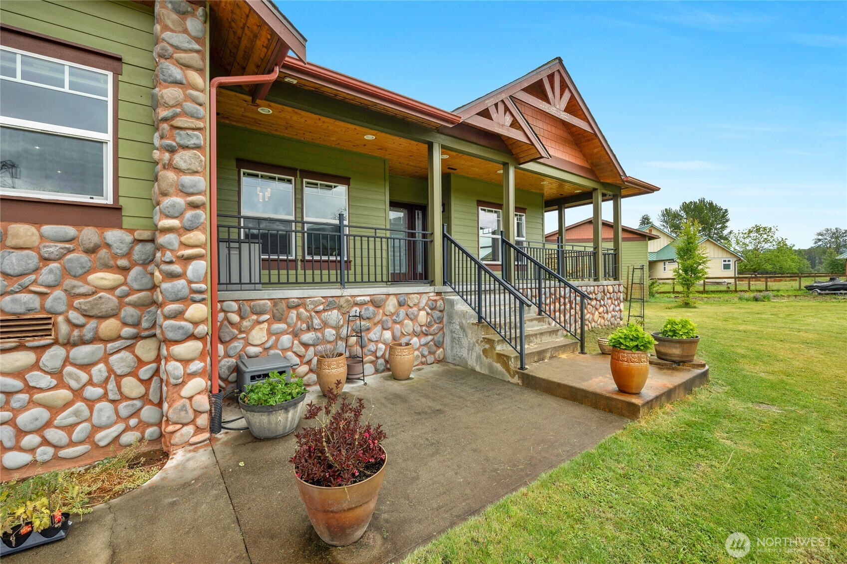 26812 162nd Street Southeast Monroe, WA 98272 - Photo 34 of 40 a backyard of a house with outdoor seating