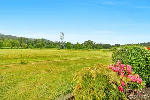 a view of an ocean and a mountain