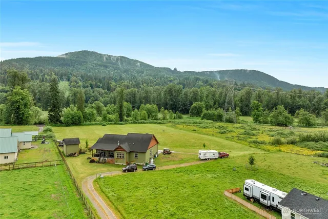 a view of a golf course with chairs