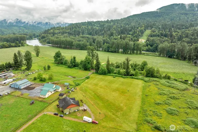 a view of a lake with a yard