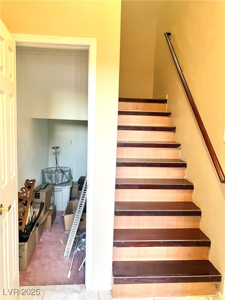2975 Bluegrass Lane, Unit 521 Henderson, NV 89074 - Photo 28 of 35 Stairs from garage plus bonus storage