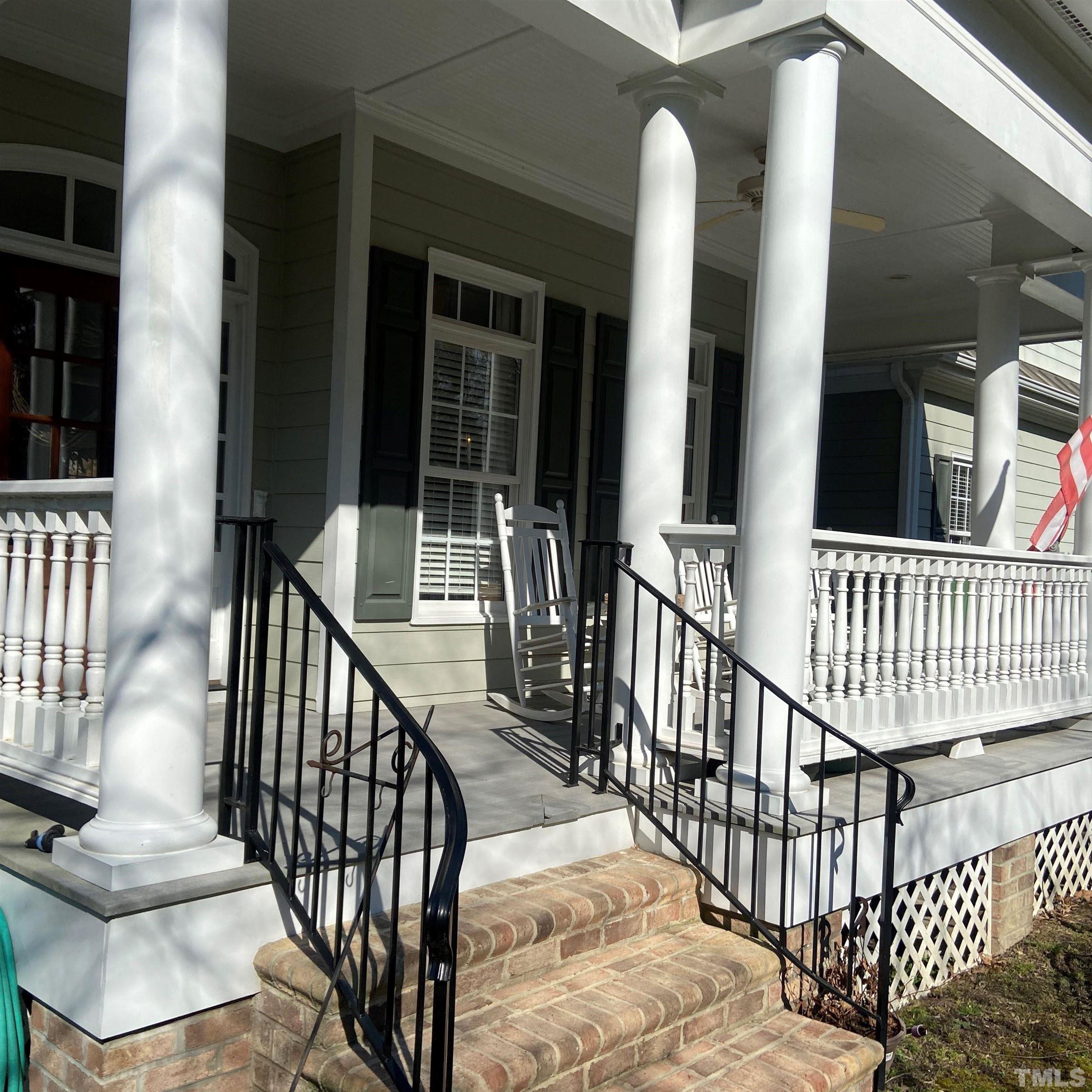 65 Oak Grove Church Road Youngsville, NC 27596 - Photo 3 of 9 a view of staircase with railing and white walls