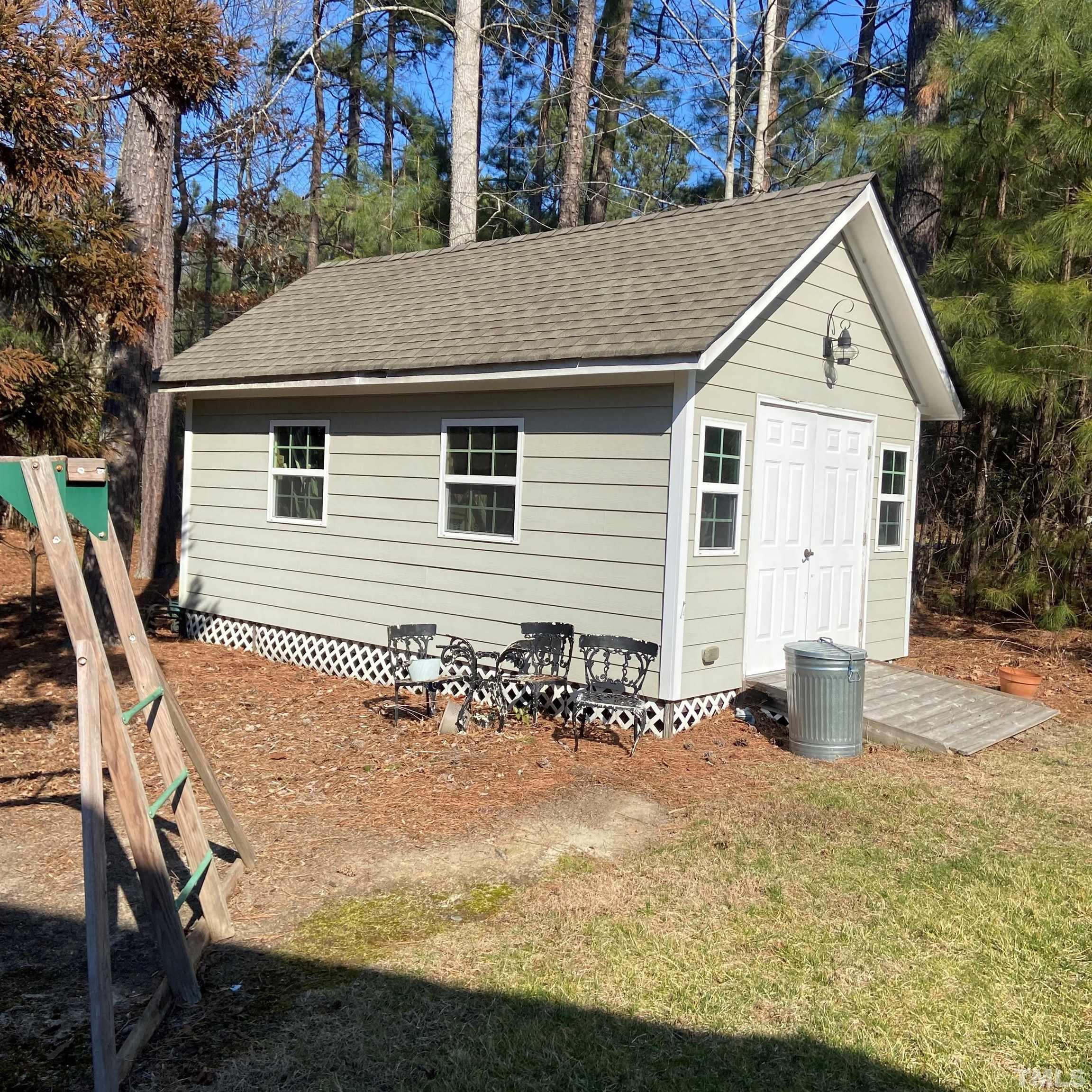 65 Oak Grove Church Road Youngsville, NC 27596 - Photo 6 of 9 a view of backyard of the house