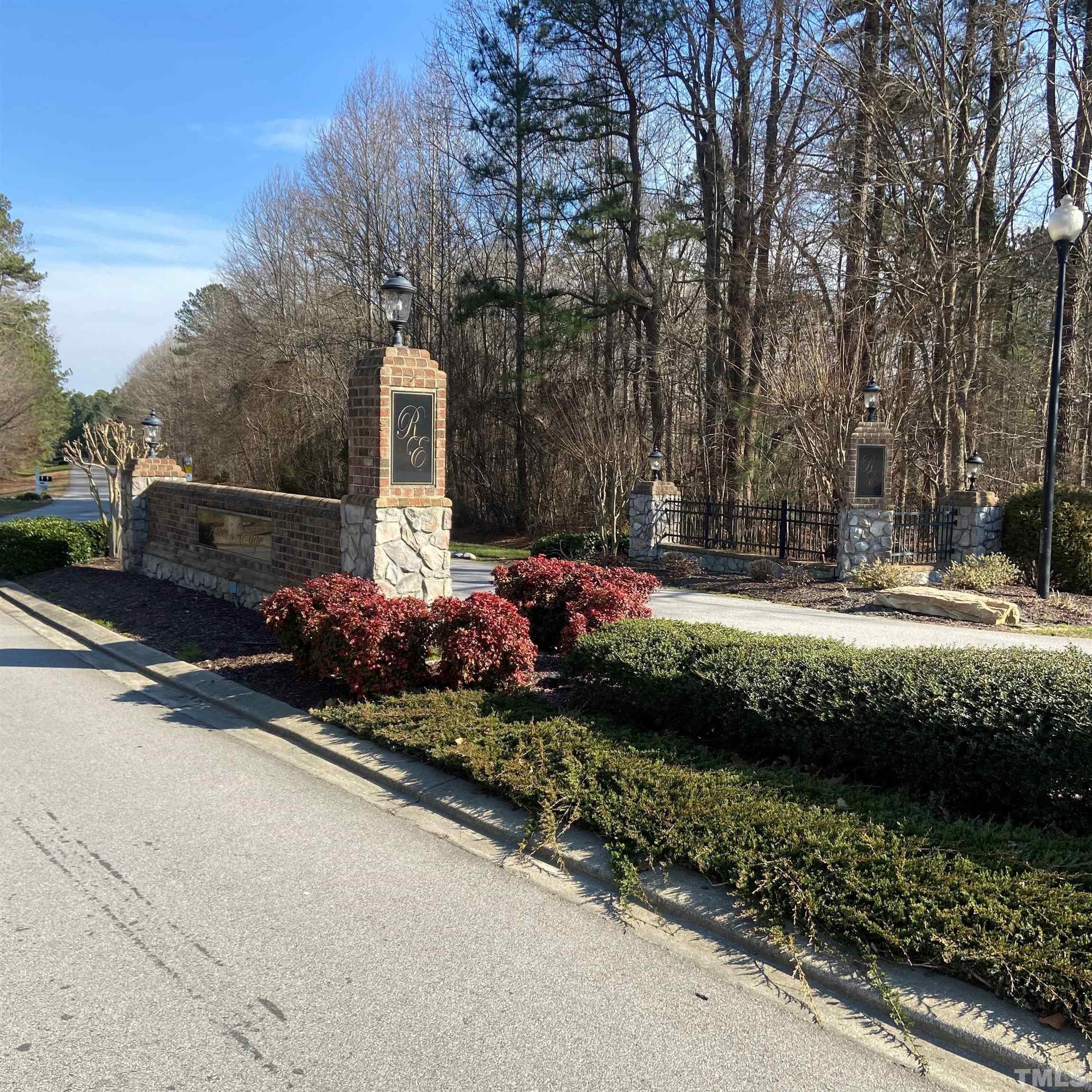 65 Oak Grove Church Road Youngsville, NC 27596 - Photo 7 of 9 a front view of a house with a yard