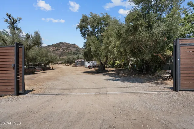 a view of a street with a house