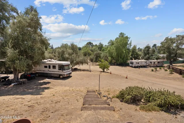 a very nice looking room with a large window and a couch