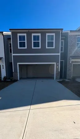 a house that has a window in front of it