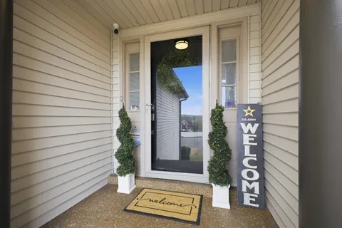 a view of a entryway door front of house