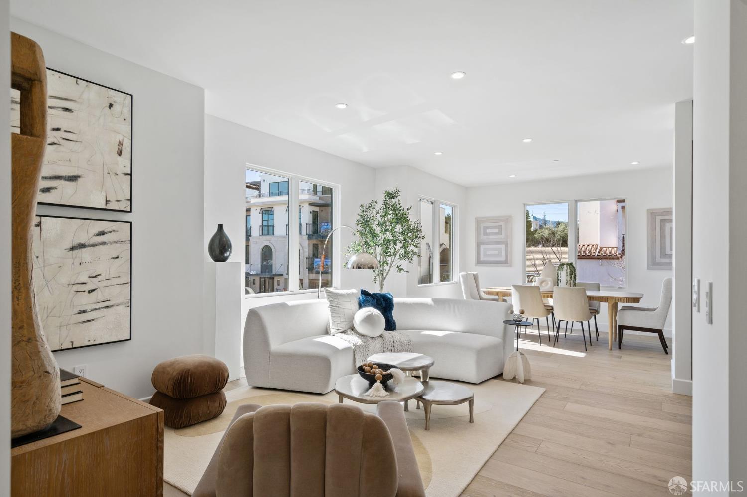 425 1st Street, Unit 31 Los Altos, CA 94022 - Photo 2 of 19 a living room with furniture and a large window