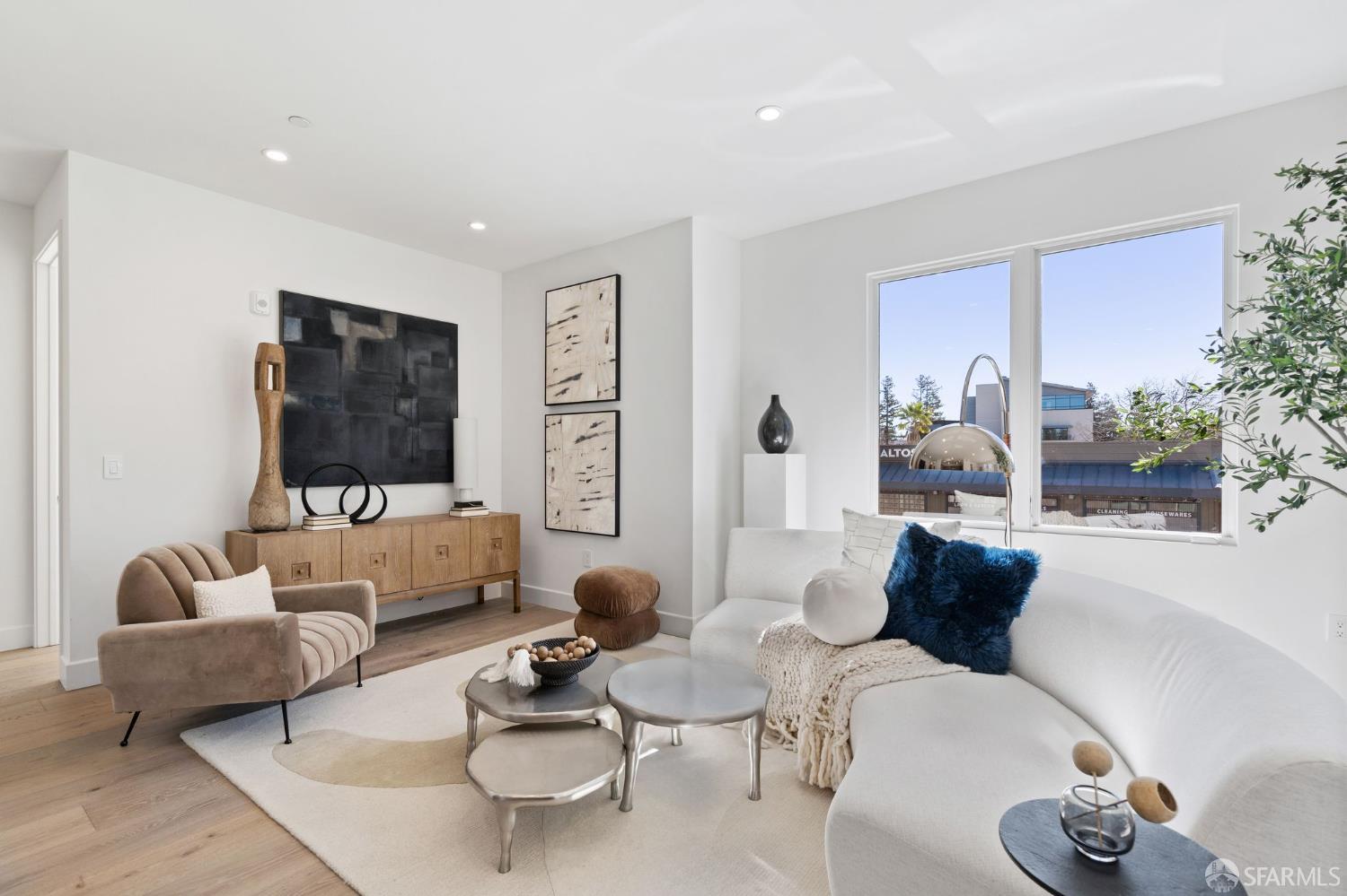 425 1st Street, Unit 31 Los Altos, CA 94022 - Photo 4 of 19 a living room with furniture and a large window