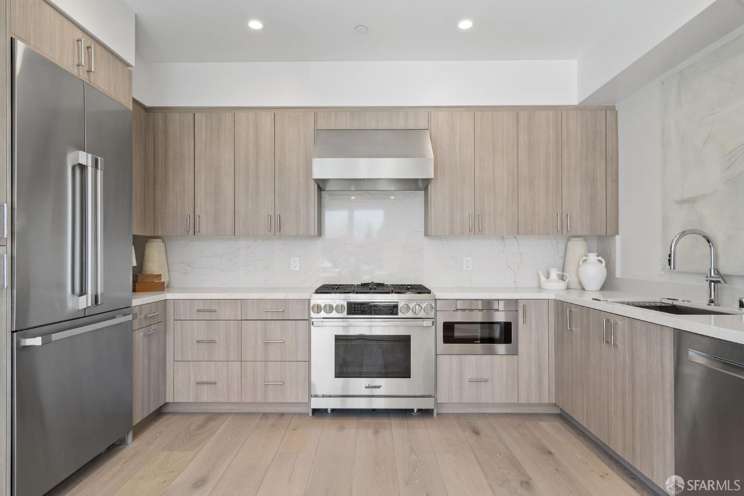 425 1st Street, Unit 31 Los Altos, CA 94022 - Photo 6 of 19 a kitchen with a stove and a refrigerator
