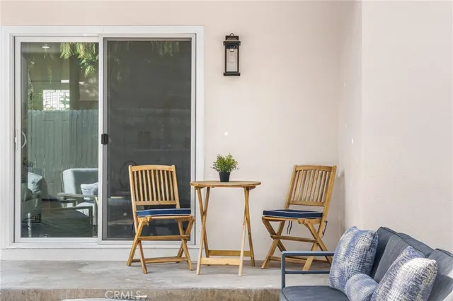 a view of a livingroom with furniture and a chair