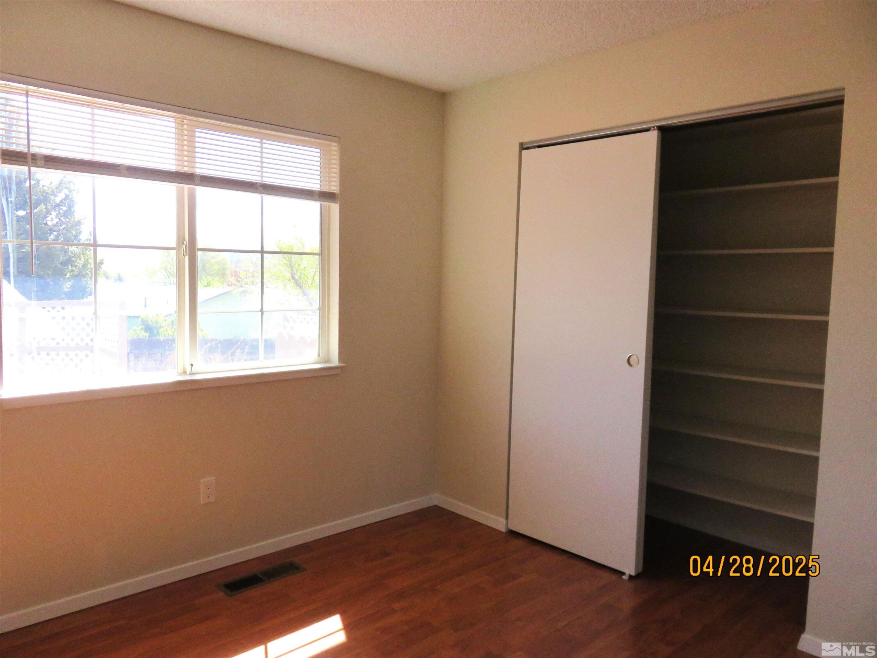 3973 Knoblock Road Carson City, NV 89706 - Photo 22 of 39 a view of walk in closet with empty racks