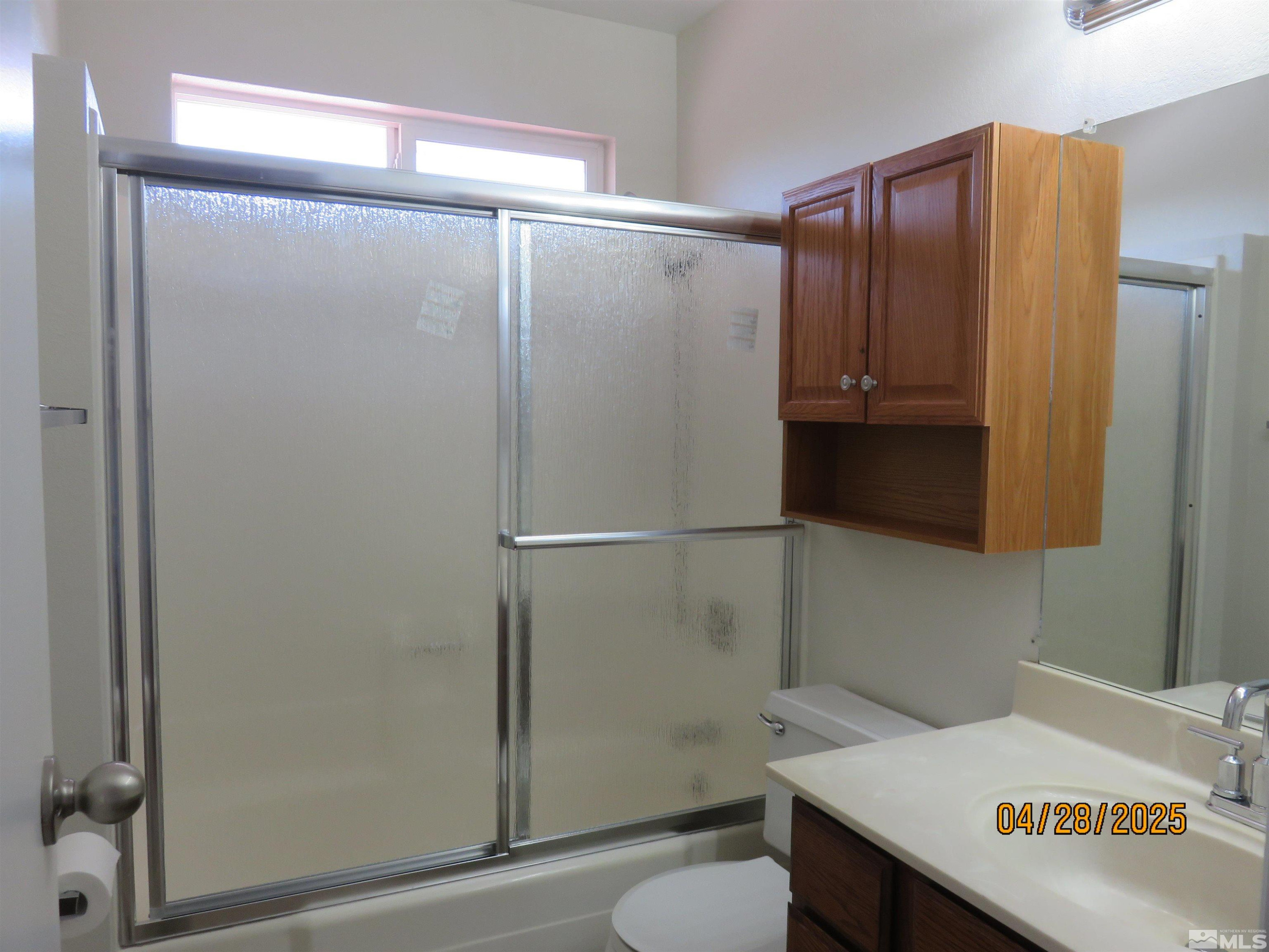 3973 Knoblock Road Carson City, NV 89706 - Photo 23 of 39 a bathroom with a shower and a toilet