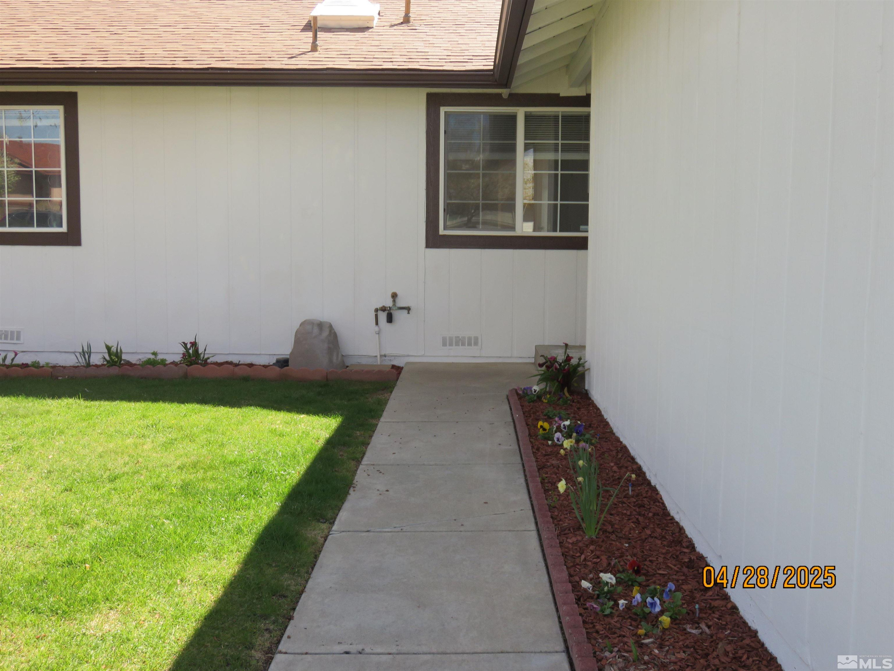3973 Knoblock Road Carson City, NV 89706 - Photo 3 of 39 a view of a backyard of the house
