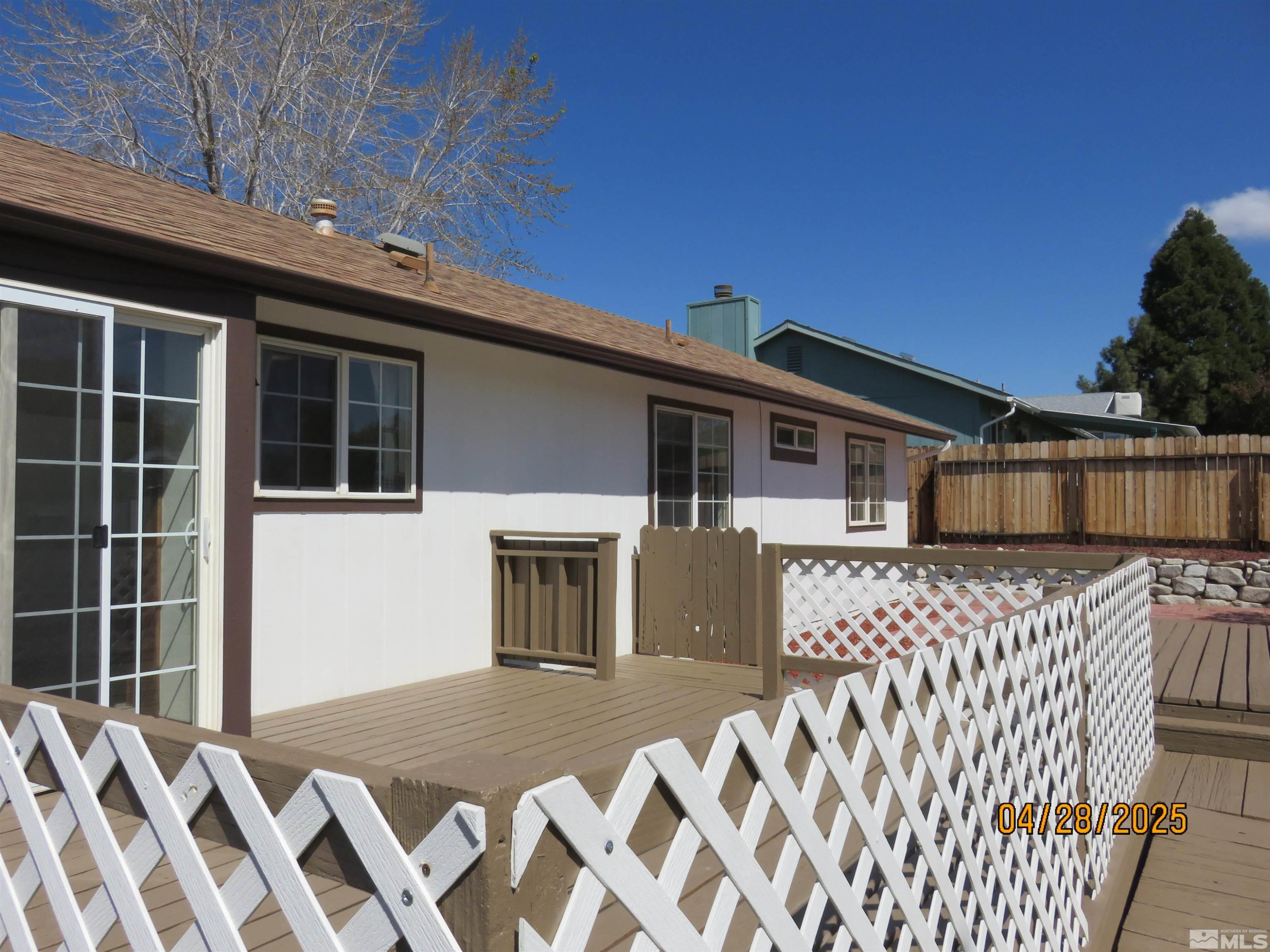 3973 Knoblock Road Carson City, NV 89706 - Photo 39 of 39 a front view of a house with a large window