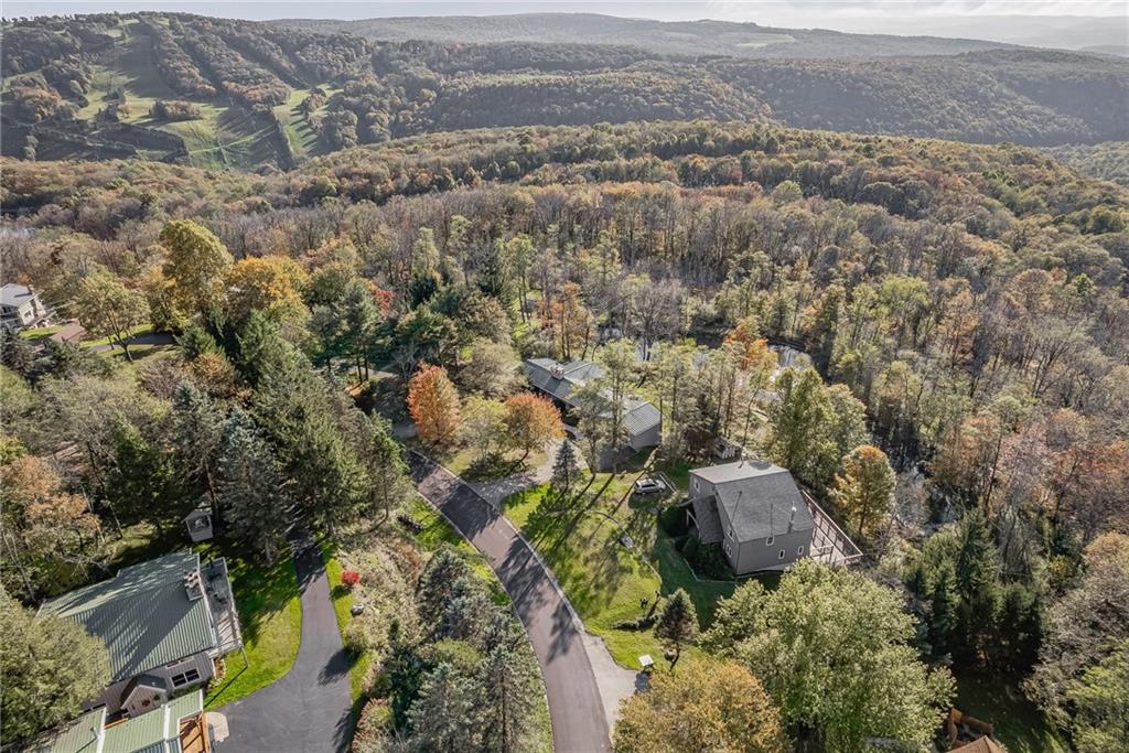 256 Alpine Heights Road Champion, PA 15622 - Photo 44 of 50 an aerial view of house with yard and mountain view in back
