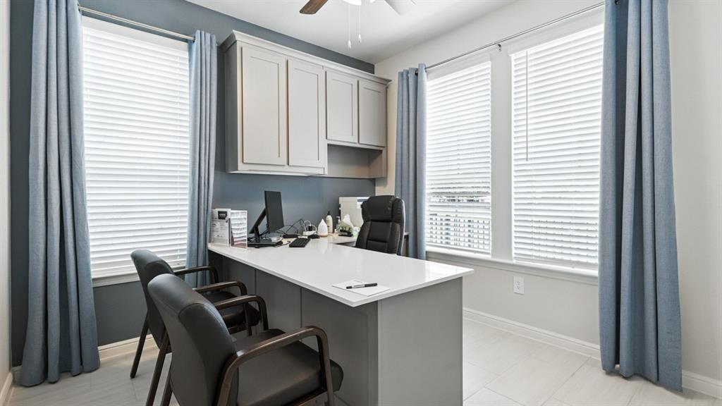304 Perk Street Keene, TX 76059 - Photo 20 of 34 a kitchen with a sink cabinets and a window