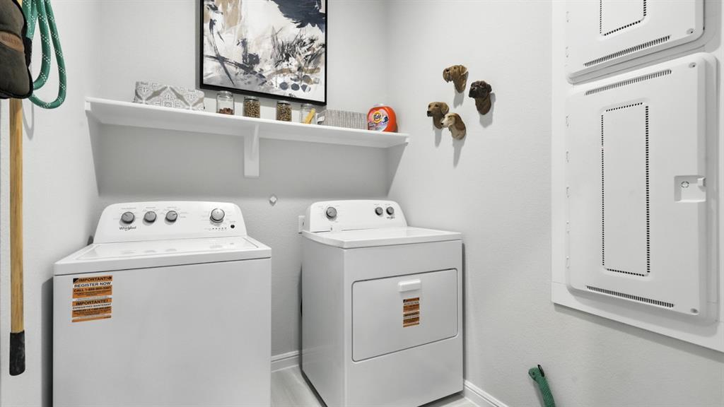 304 Perk Street Keene, TX 76059 - Photo 28 of 34 a utility room with dryer and washer