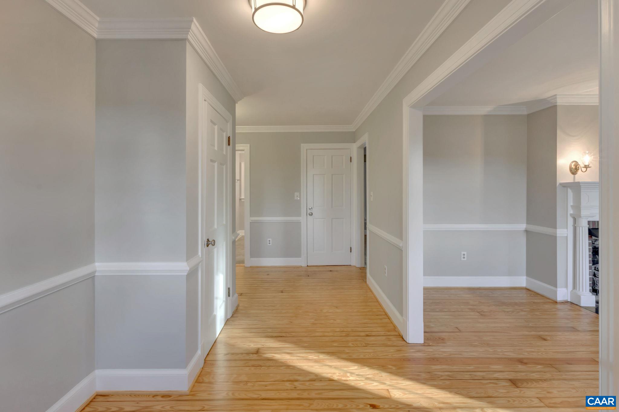 3432 Keswick Road Keswick, VA 22947 - Photo 15 of 60 a view of a hallway with wooden floor and closet