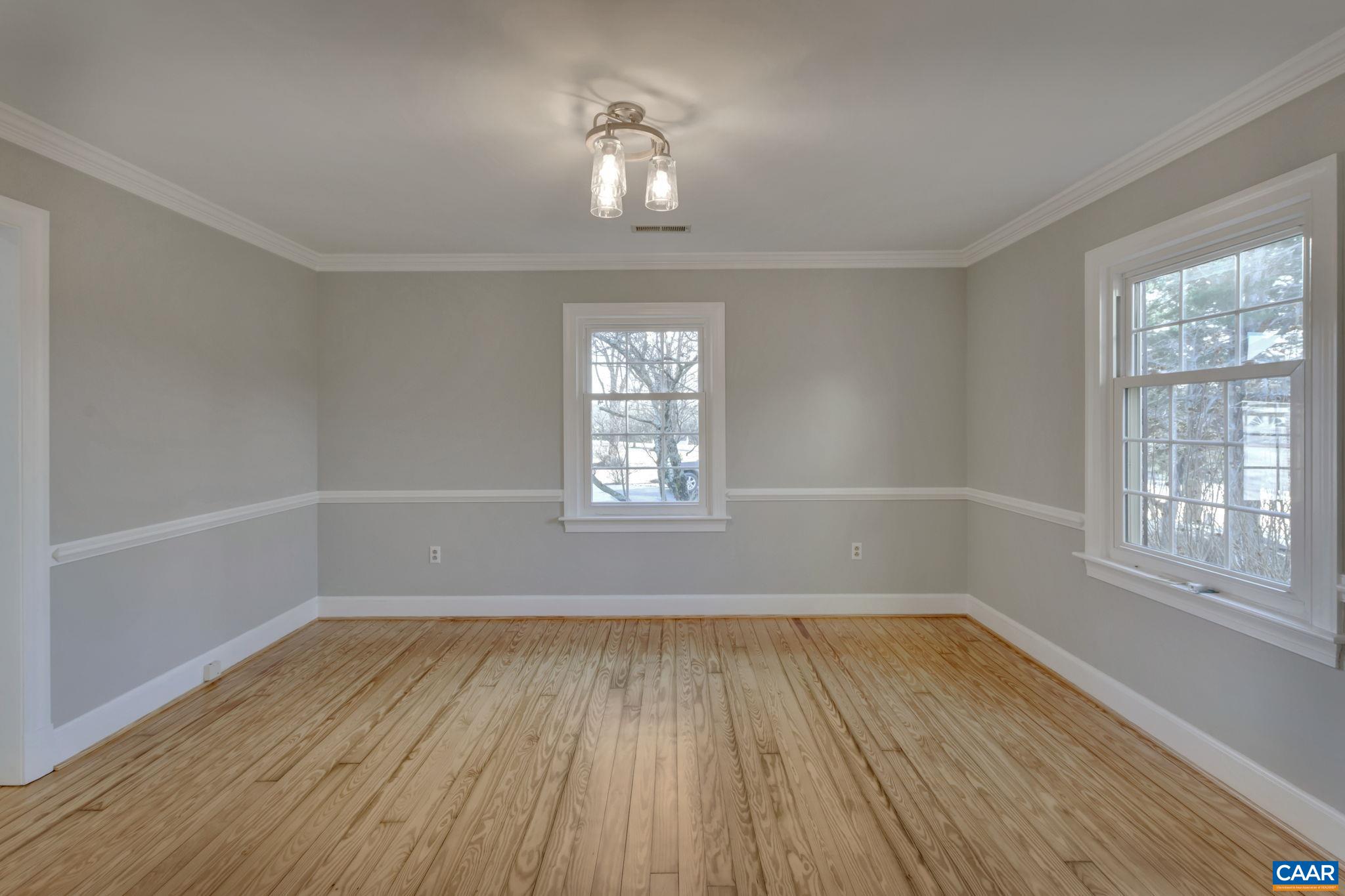 3432 Keswick Road Keswick, VA 22947 - Photo 19 of 60 wooden floor in an empty room with a window