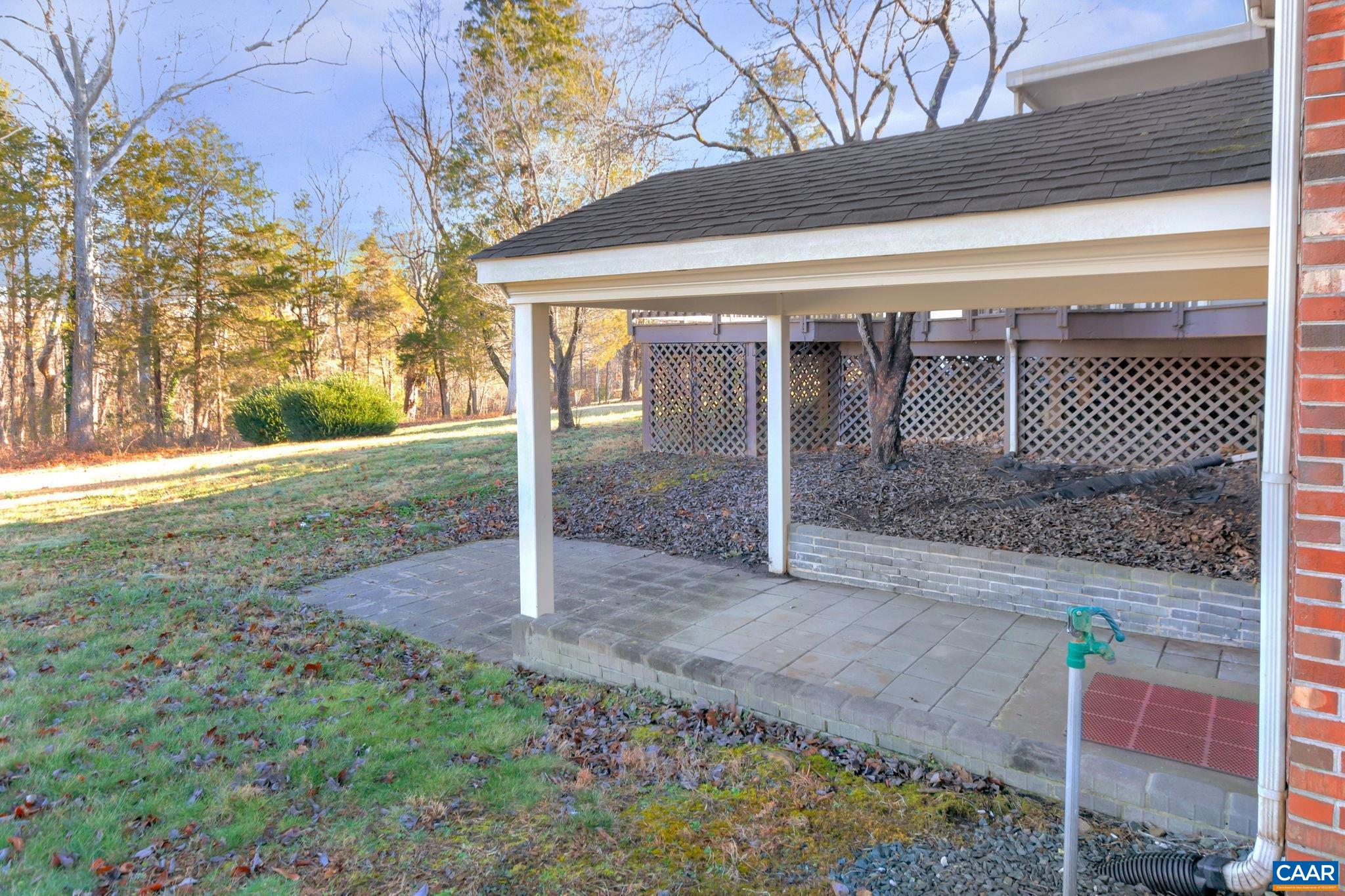 3432 Keswick Road Keswick, VA 22947 - Photo 46 of 60 a view of a backyard with large trees