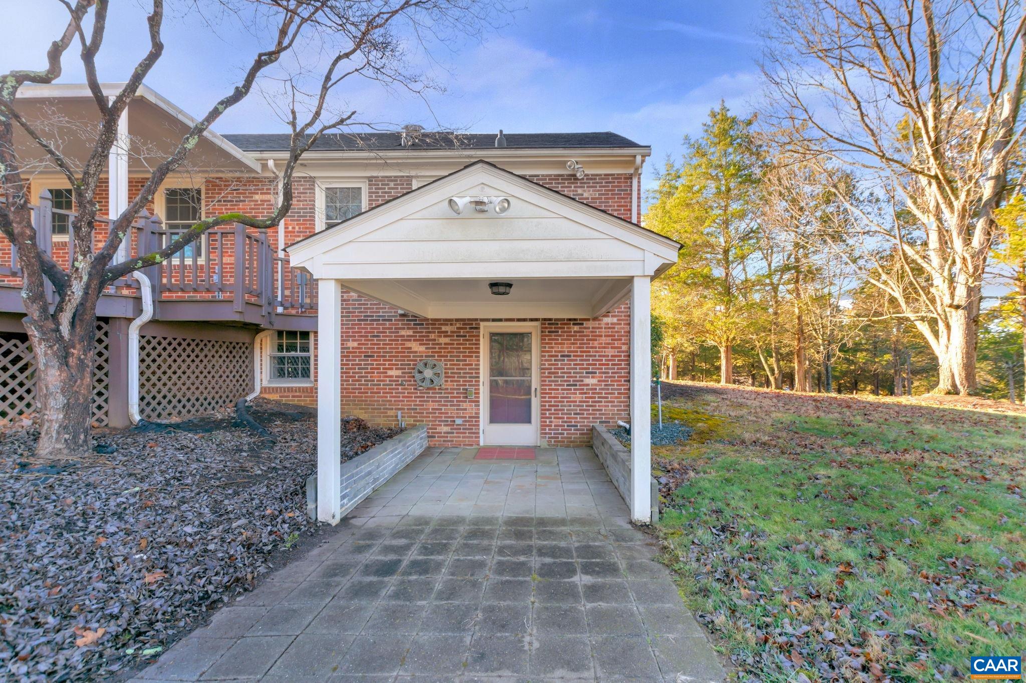 3432 Keswick Road Keswick, VA 22947 - Photo 47 of 60 a view of a house with a yard and garage