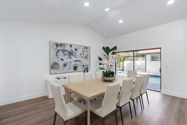 a kitchen with a sink and wooden cabinets