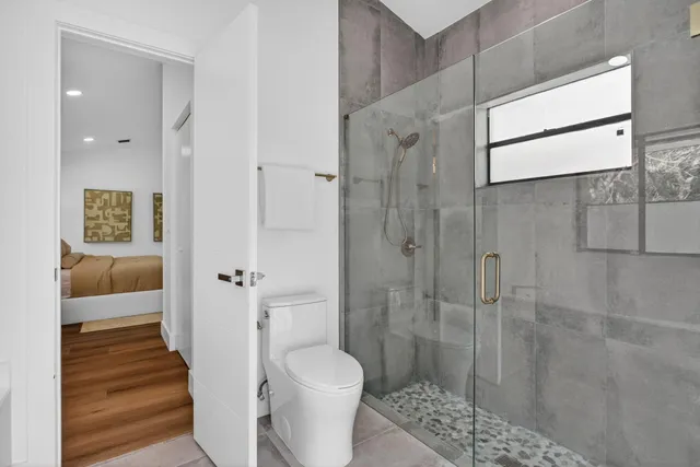 a bathroom with a bathtub and window