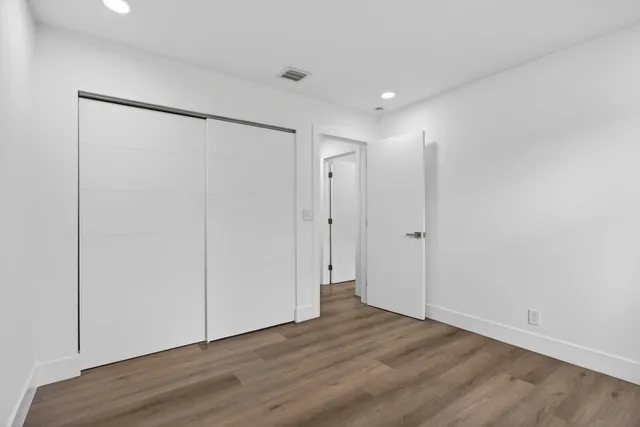 a bathroom with a sink a toilet and bathtub