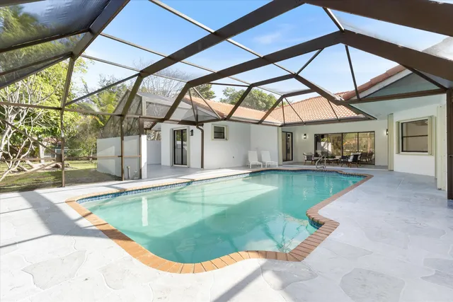 a view of a lake with a yard