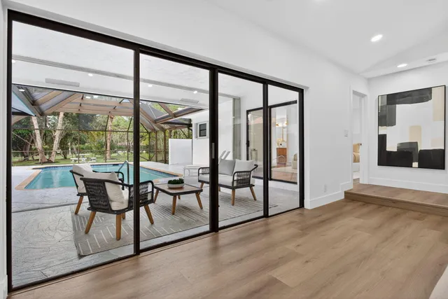 a kitchen with a table and chairs