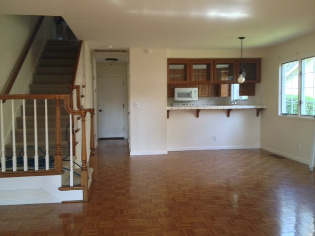 187 Redding Road Campbell, CA 95008 - Photo 6 of 24 an empty room with windows and cabinet