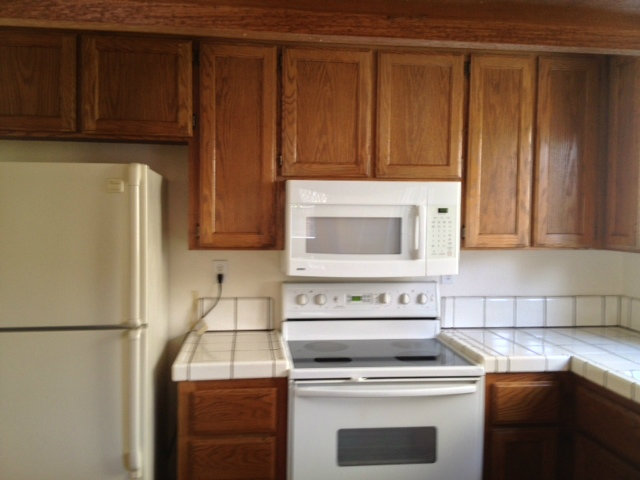 187 Redding Road Campbell, CA 95008 - Photo 8 of 24 a kitchen with appliances and cabinets