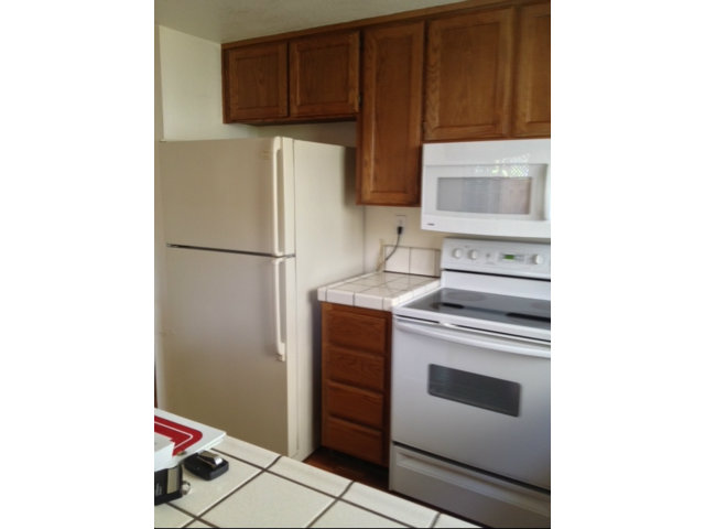 187 Redding Road Campbell, CA 95008 - Photo 9 of 24 a kitchen with a refrigerator and a stove