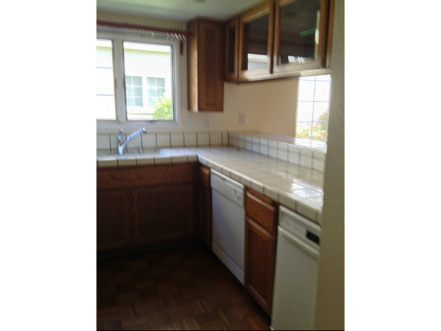 187 Redding Road Campbell, CA 95008 - Photo 10 of 24 a kitchen with a sink and a window