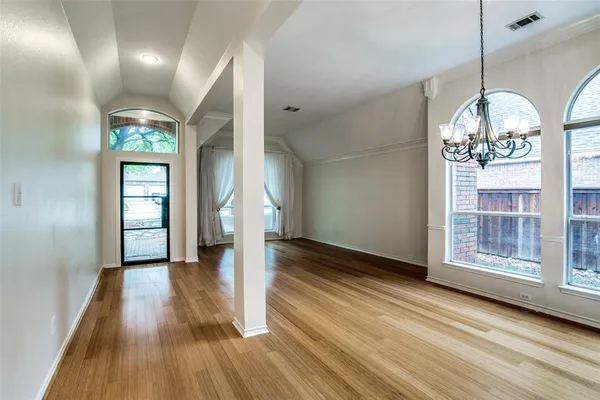 a view of gallery with wooden floor