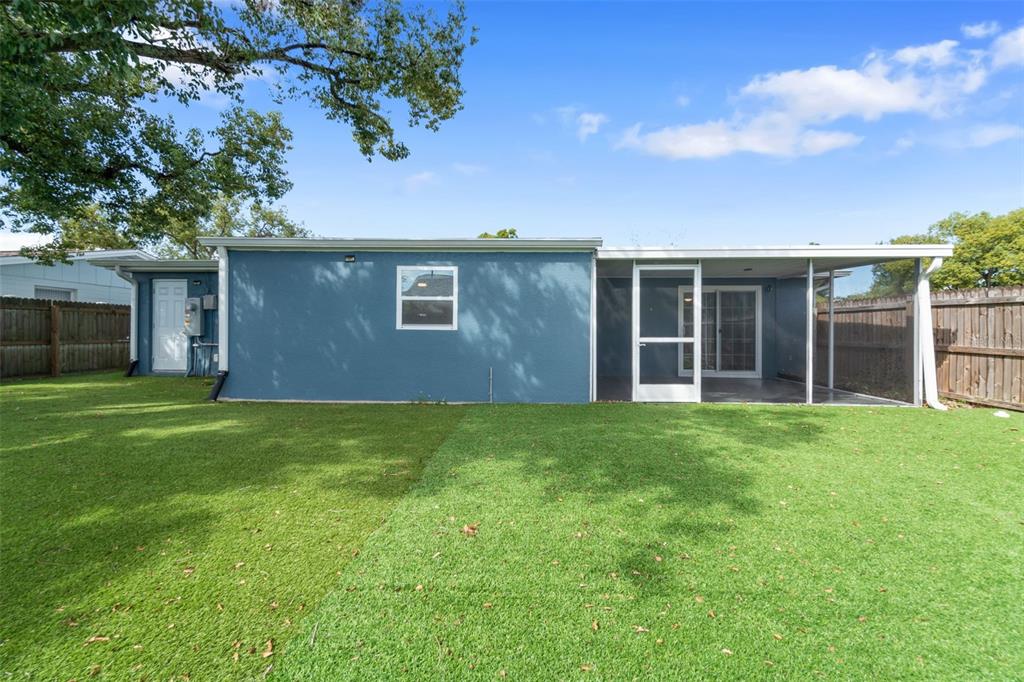 4238 Glissade Drive New Port Richey, FL 34652 - Photo 41 of 62 a view of a backyard with potted plants and large tree